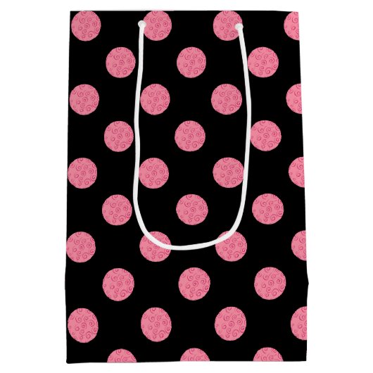 黒い渦巻形の背景にピンクの水玉模様 ミディアムペーパーバッグ (裏面)