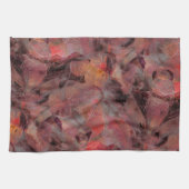 黒い灰色の粒状の背景に赤い色合いの汚れ キッチンタオル (横)