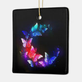 黒い白熱［赤熱］光を放つ背景にネオンの夜蝶 セラミックオーナメント (左)