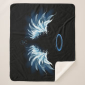 黒い白熱［赤熱］光を放つ背景の青いエンジェルウィングス シェルパブランケット (正面)