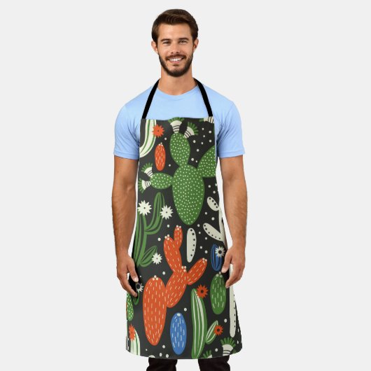 黒い背景にサボテンを塗ったシームレスな模様。 エプロン (着用した状態)