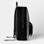 黒い背景にシルバードッグポー プリントバックパック (左)