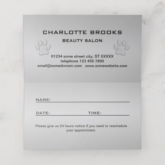 黒い背景にシルバードッグポー 予約カード (内部開封)