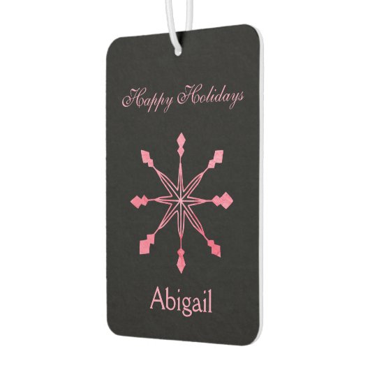 黒い背景にピンクの雪が積もる カーエアーフレッシュナー (左)