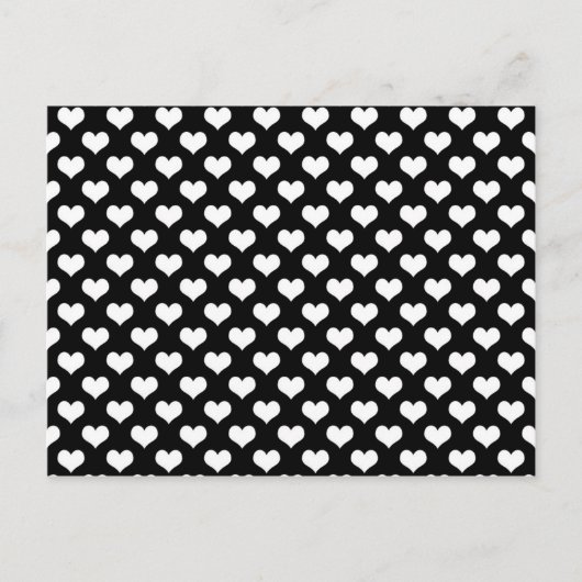 黒い背景に白いハートのパターンがある ポストカード (正面)
