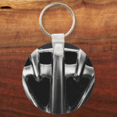 黒い背景に自転車のヘルメン キーホルダー (正面)