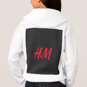 黒い背景に赤いH&Mのロゴ (裏面)
