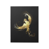 黒い背景に金色の鳥 ノートパッド (回転)