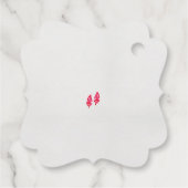 黒い背景に離れある赤い一組 フェイバータグ (裏面)