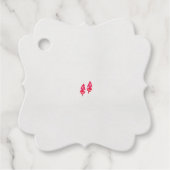 黒い背景に離れある赤い一組 フェイバータグ (正面)