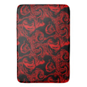 黒い背景に非常に汚れた赤い螺旋状パーツ バスマット (正面縦)