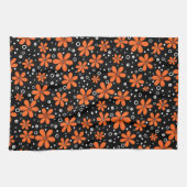 黒い背景に鮮やかなオレンジ色の花とw キッチンタオル (横)