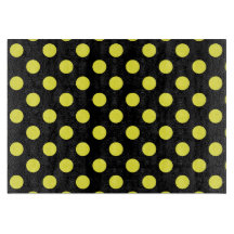 黒い背景に黄色の水玉模様