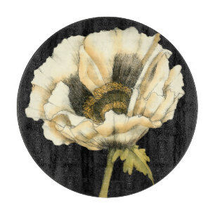 黒い背景のクリーム色のケシの花 カッティングボード