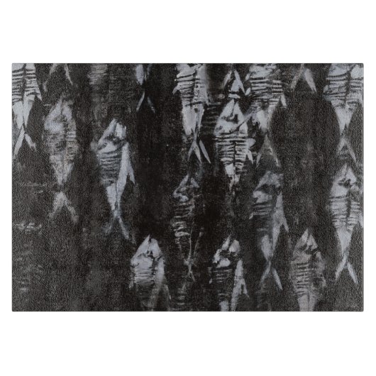 黒い背景の化石の白身魚 カッティングボード (正面)