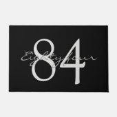 黒い背景の文字と数値 ドアマット (正面)