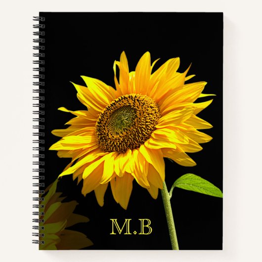 黒い背景の明るいひまわり ノートブック (正面)