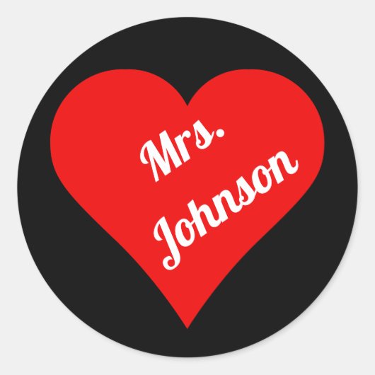 黒い背景の赤いハート ラウンドシール (正面)