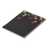 黒い背景の金ゴールドと赤いハート ノートパッド (回転)