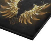 黒い背景の黄金の天使の翼 カッティングボード (角)