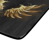 黒い背景の黄金の天使の翼 カッティングボード (角)