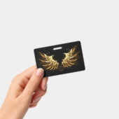 黒い背景の黄金の天使の翼 バッジ (手持ち)