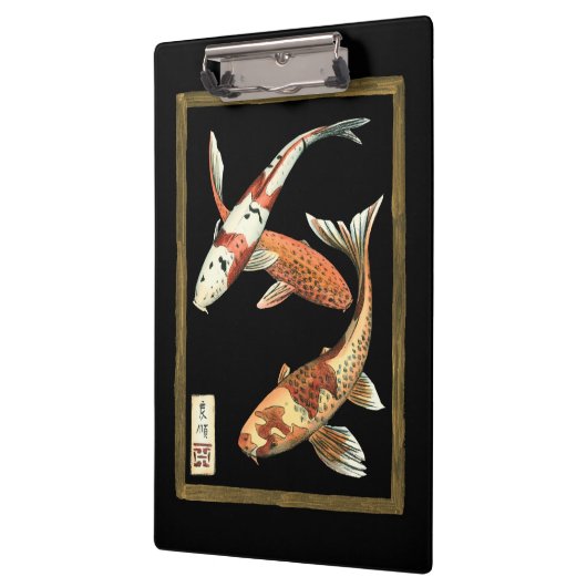 黒い背景の2人の日本人のコイの金魚 クリップボード (左)