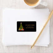 黒い背景を持つクリスマス金ゴールドツリー ラベル (インサイチュ)