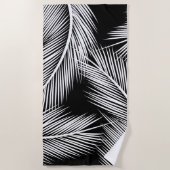 黒い色の背景に白いヤシの離れ ビーチタオル (正面)