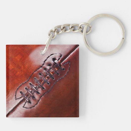 黒い赤と白のフットボールのギフトのキーホルダー キーホルダー (裏面)