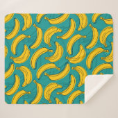 黒い輪郭のシームレスな模様を持つ黄色のバナナ  シェルパブランケット (正面(横))