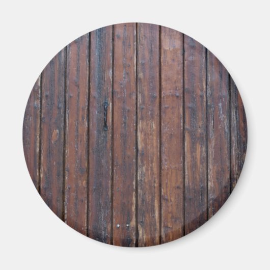 黒い鉄の支えを持つ古い茶色の木製ドア マグネット (正面)