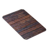 黒い鉄の支えを持つ古い茶色の木製ドア マグネット (右側)