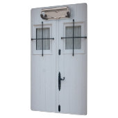 黒い錬鉄のバーが付いている白い木のドア クリップボード (左)