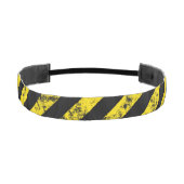 黒い黄色のグランジ注意テープストライプのパターン アスレチックヘッドバンド (正面)