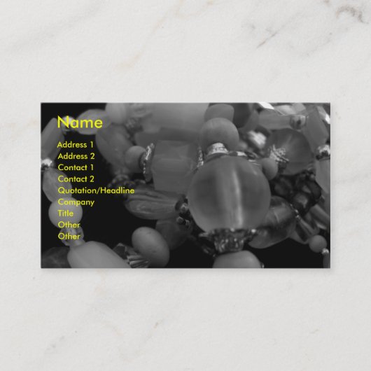 "黒い"および白のもつれさせた腕輪 名刺 (正面)