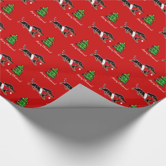 黒およびタンのダックスフントのクリスマスのランニング ラッピングペーパー (角)