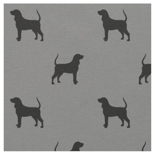 黒およびタンのCoonhoundのシルエットパターン ファブリック (クローズアップ)