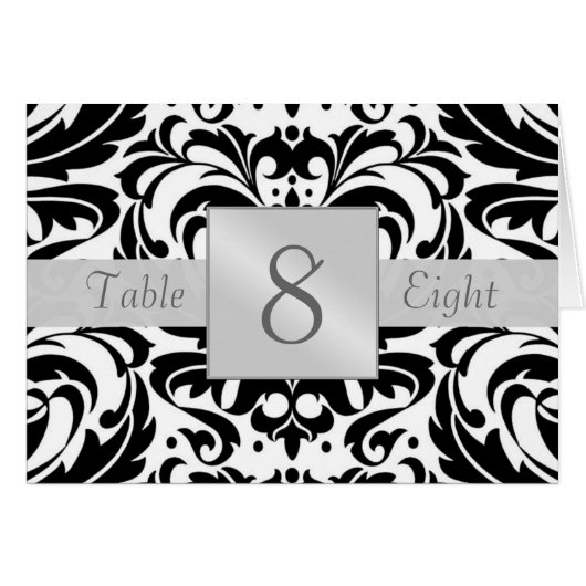 黒く及び白いダマスク織のテーブルの数によって折られるカード (正面横)