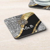 黒く及び白い花のダマスク織パターン コースター (左側)