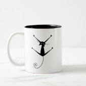 黒く風変わりな子猫10 ツートーンマグカップ (左)