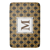 黒く、青銅色のアールデコの幾何学的なモノグラムの バスマット (正面縦)