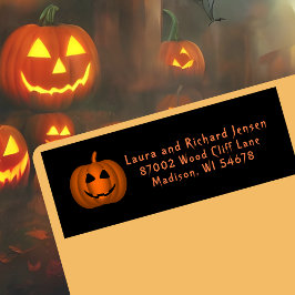 黒とオレンジの笑顔のハロウィンカボチャ ラベル