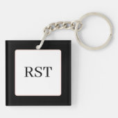 黒とグレーはかりで測 キーホルダー (裏面)