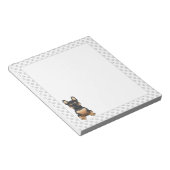 黒とタンのフランスのブルドッグの漫画の犬と足 ノートパッド (アングル)