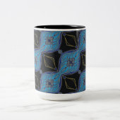 黒とティール(緑がかった色)の抽象芸術フローラダイヤモンド ツートーンマグカップ (中央)