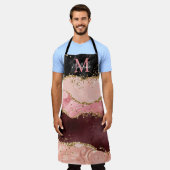 黒とピンクの続編が重なり合う エプロン (着用した状態)