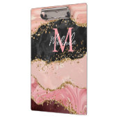 黒とピンクの続編が重なり合う クリップボード (左)