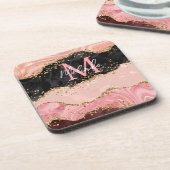 黒とピンクの続編が重なり合う コースター (左側)