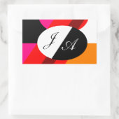 黒と白と赤のダブルモノグラム入り 長方形シール (バッグ)